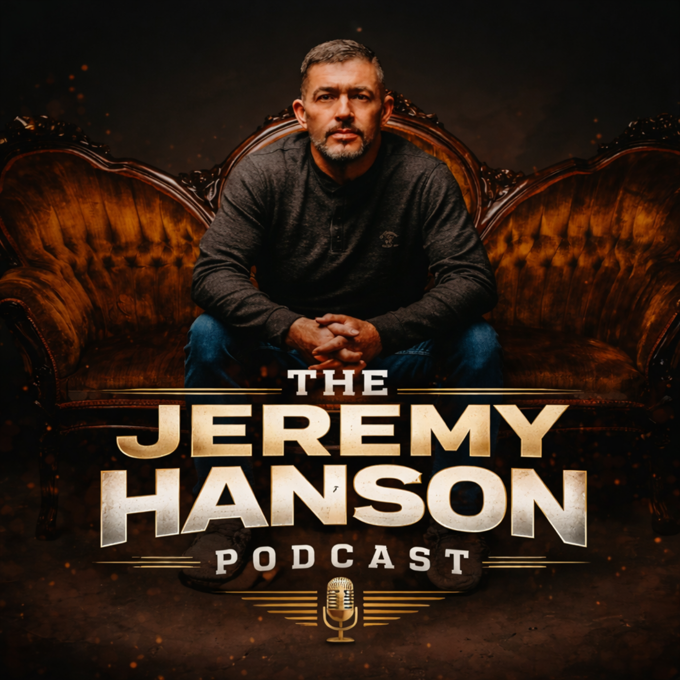 A man sitting on a vintage couch, with the text 'The Jeremy Hanson Podcast' and a microphone icon below him, set against a dark background with a warm, fiery glow.
