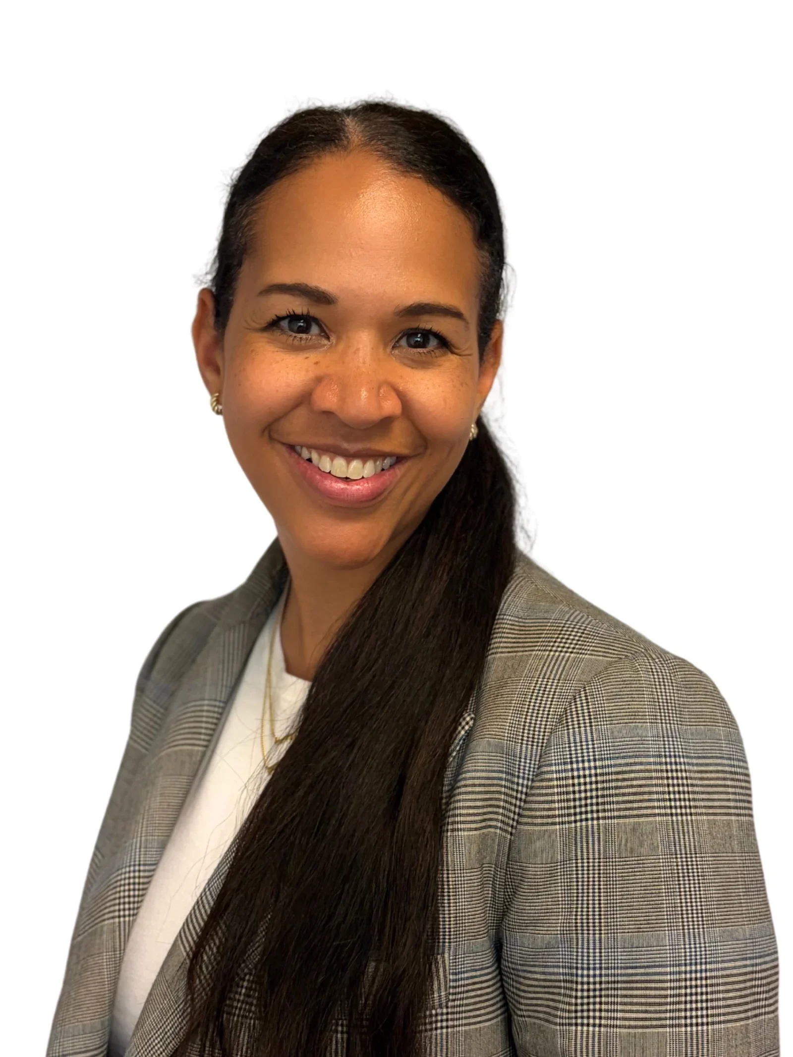 A woman with dark brown hair tied back, wearing a gray plaid blazer over a white top, smiling with a white background.