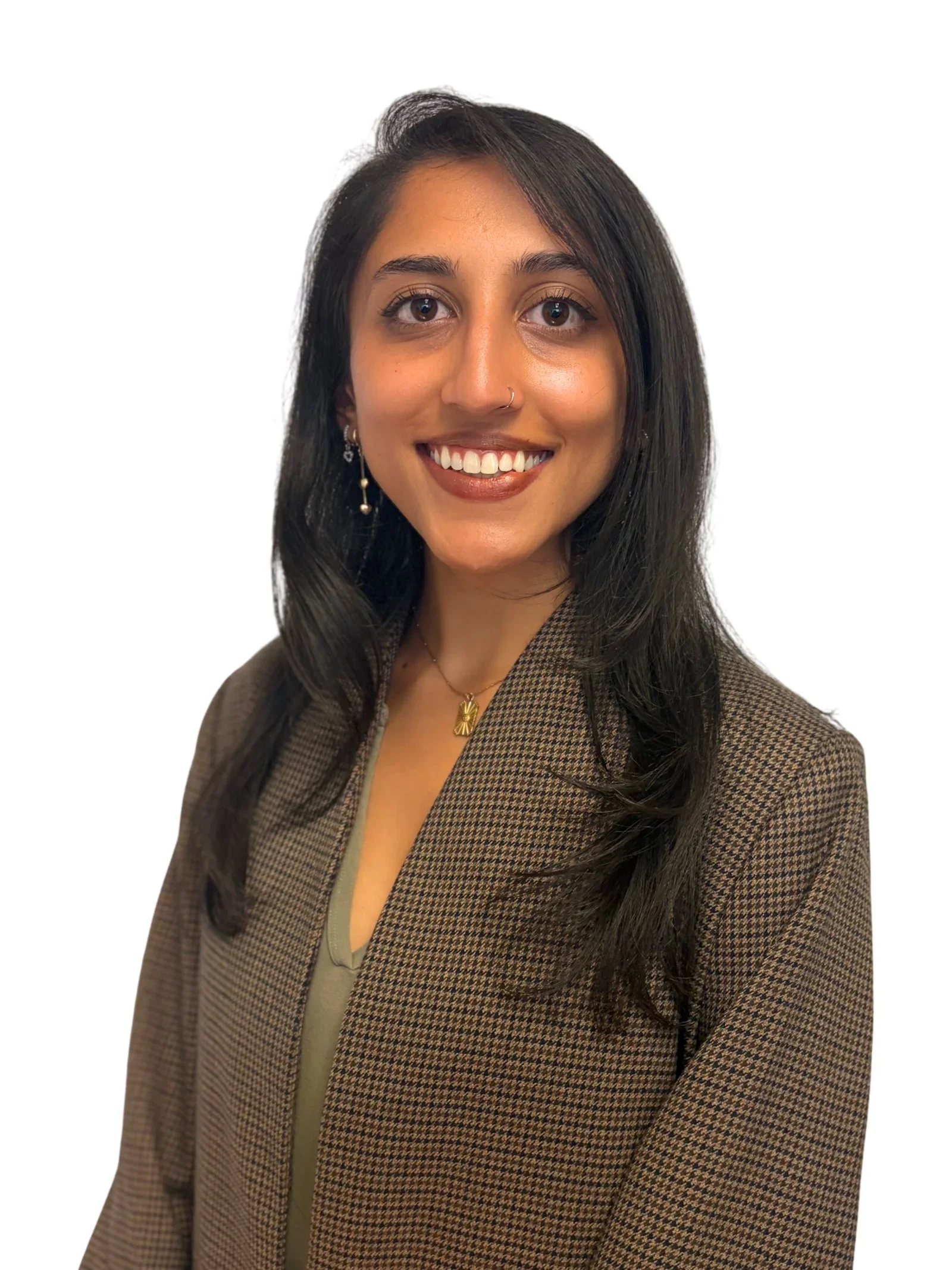 Close-up of a young woman with long black hair, smiling and wearing a brown houndstooth blazer over an olive green top, against a white background.