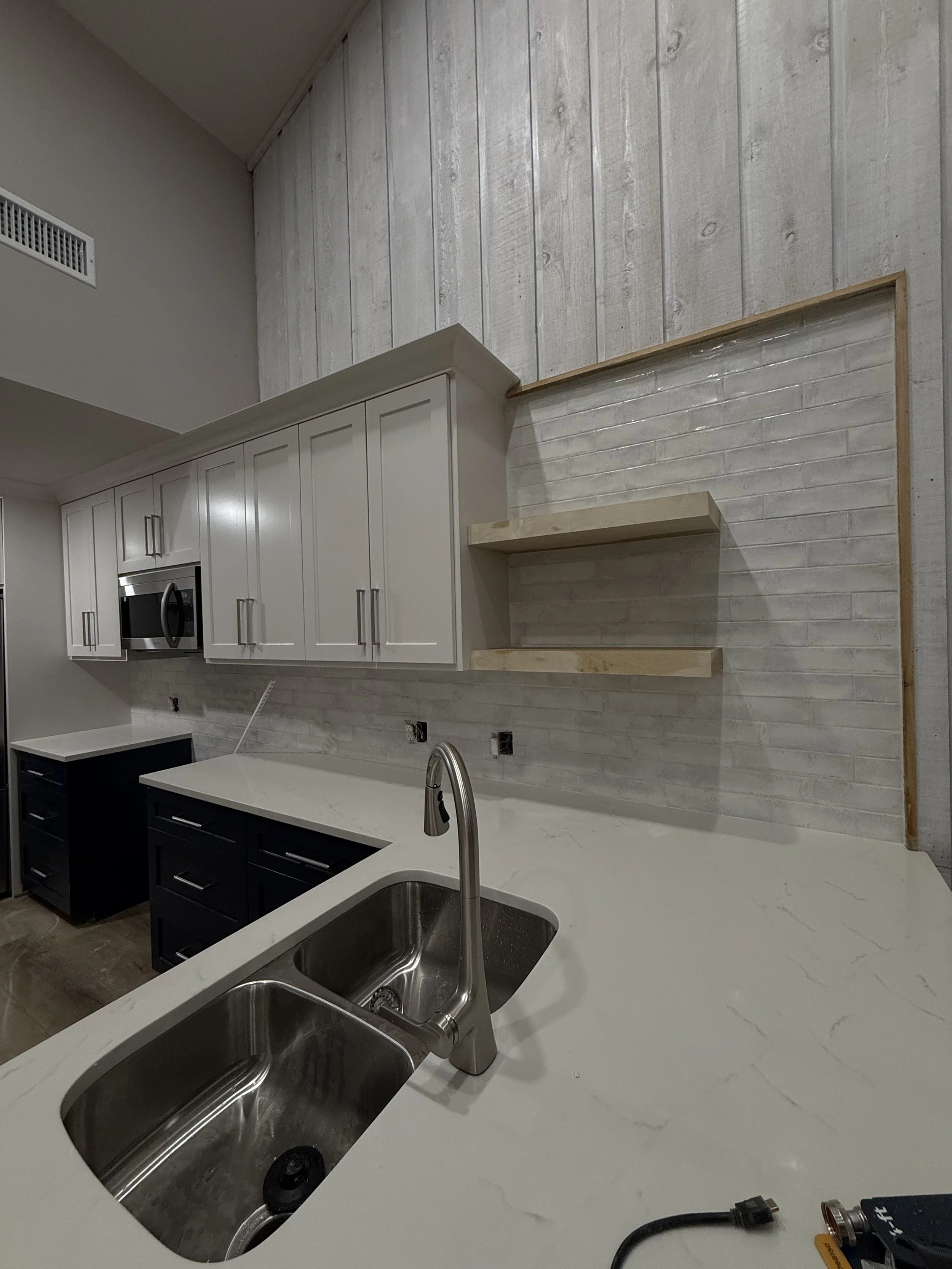 Kitchen brick pattern wall tile and backsplash installation in Greater Houston by Prestige Tile Solutions