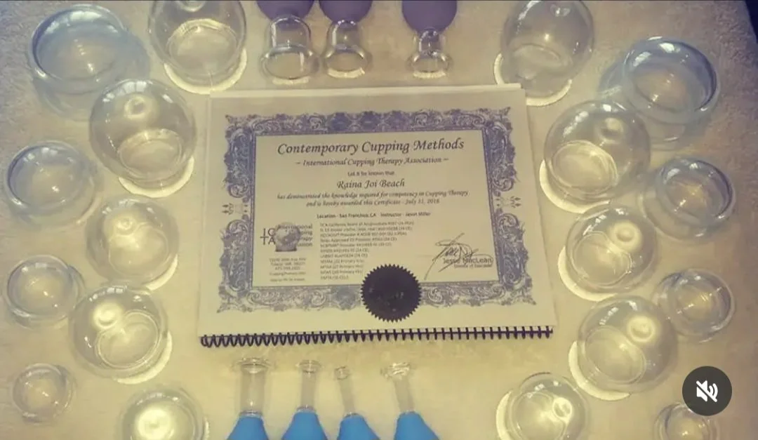 A certificate titled 'Contemporary Cupping Methods' surrounded by small glass cups used for cupping therapy, along with three blue rubber bulb syringes at the bottom.