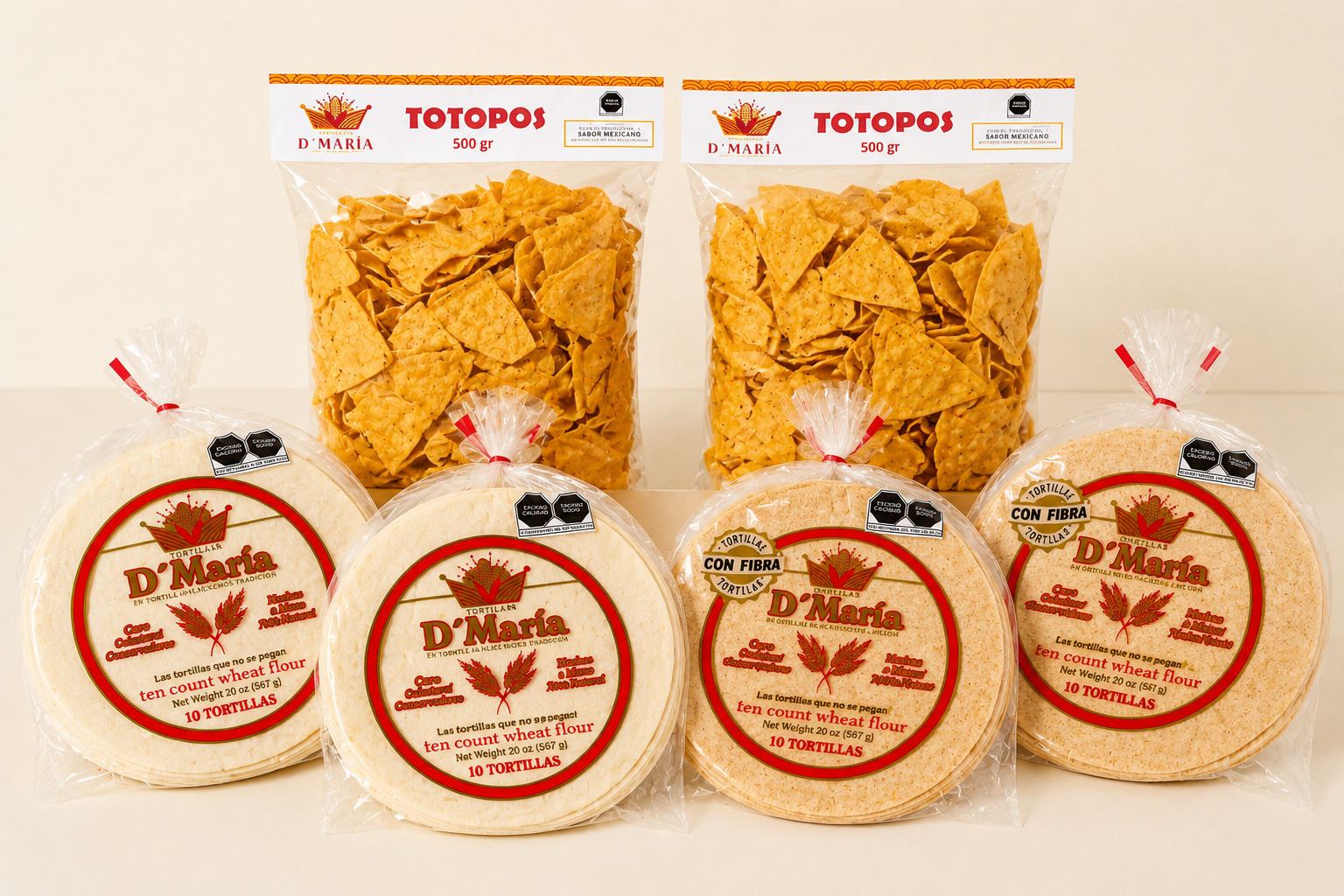 Two bags of Totopos tortilla chips and four packs of wheat flour tortillas on a white surface.