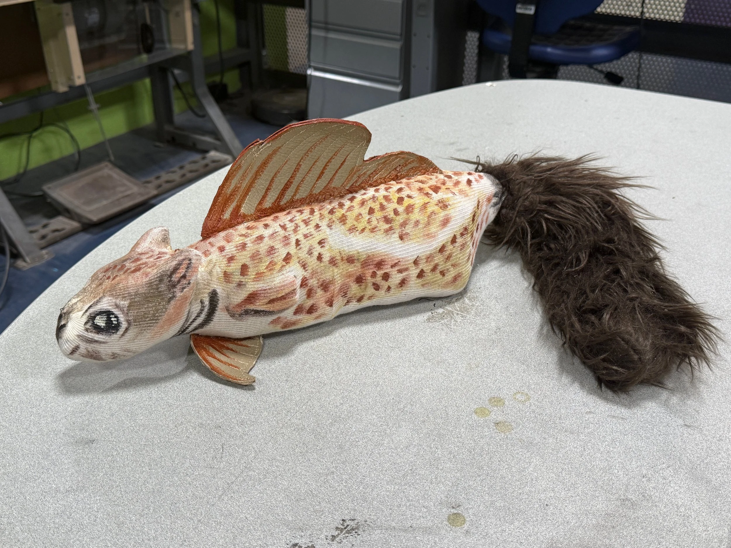 squish: leather fins with painted details