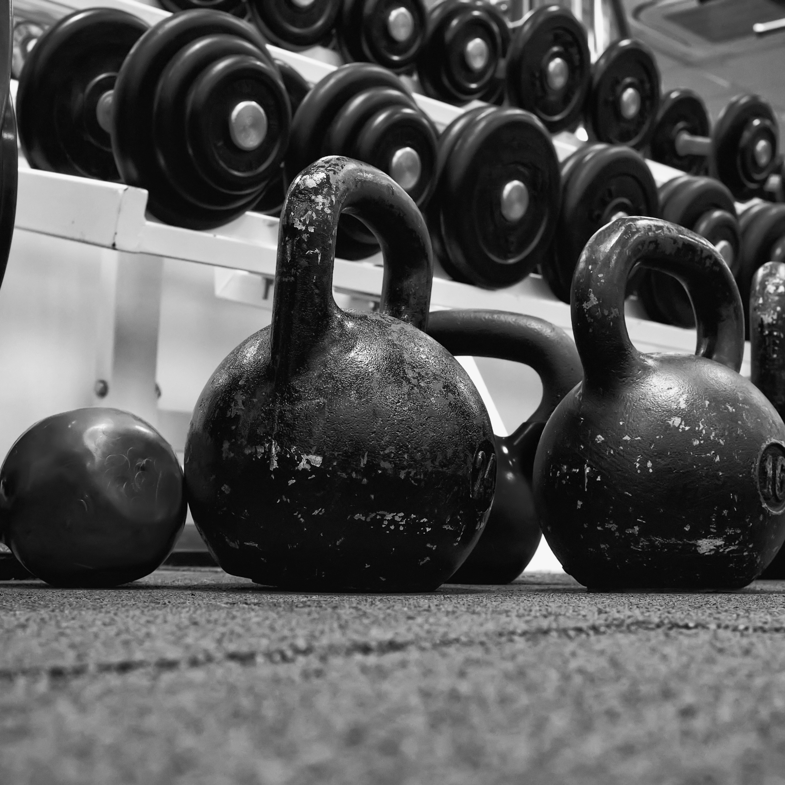 Dumbbells vs. Kettlebells: When to Use Each in Your Training