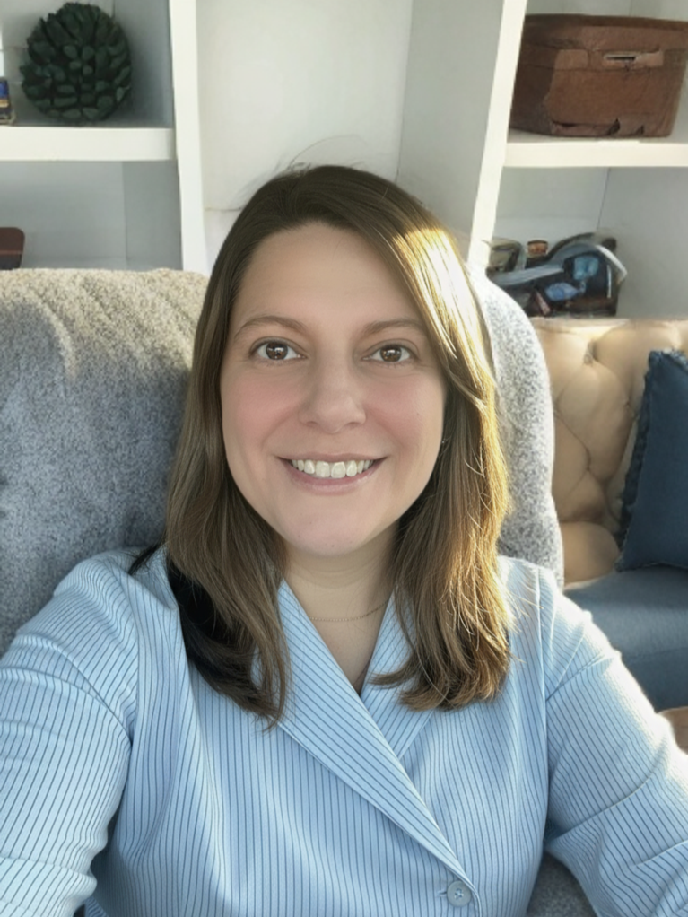 ADHD Anxiety Depression Overwhelm Burnout Therapist Melanie Bouchard Williston Vermont wearing blue in therapy office
