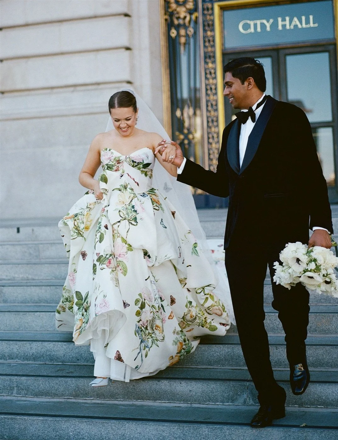 01_opener_couple-cityhall-steps_web.jpg