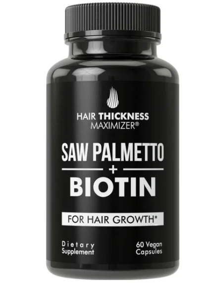 Black bottle labeled "Hair Thickness Maximizer" with ingredients "Saw Palmetto + Biotin" and mentioning "for hair growth" and "60 vegan capsules."