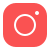 Icon of a camera with a circular lens in the center, representing Instagram.