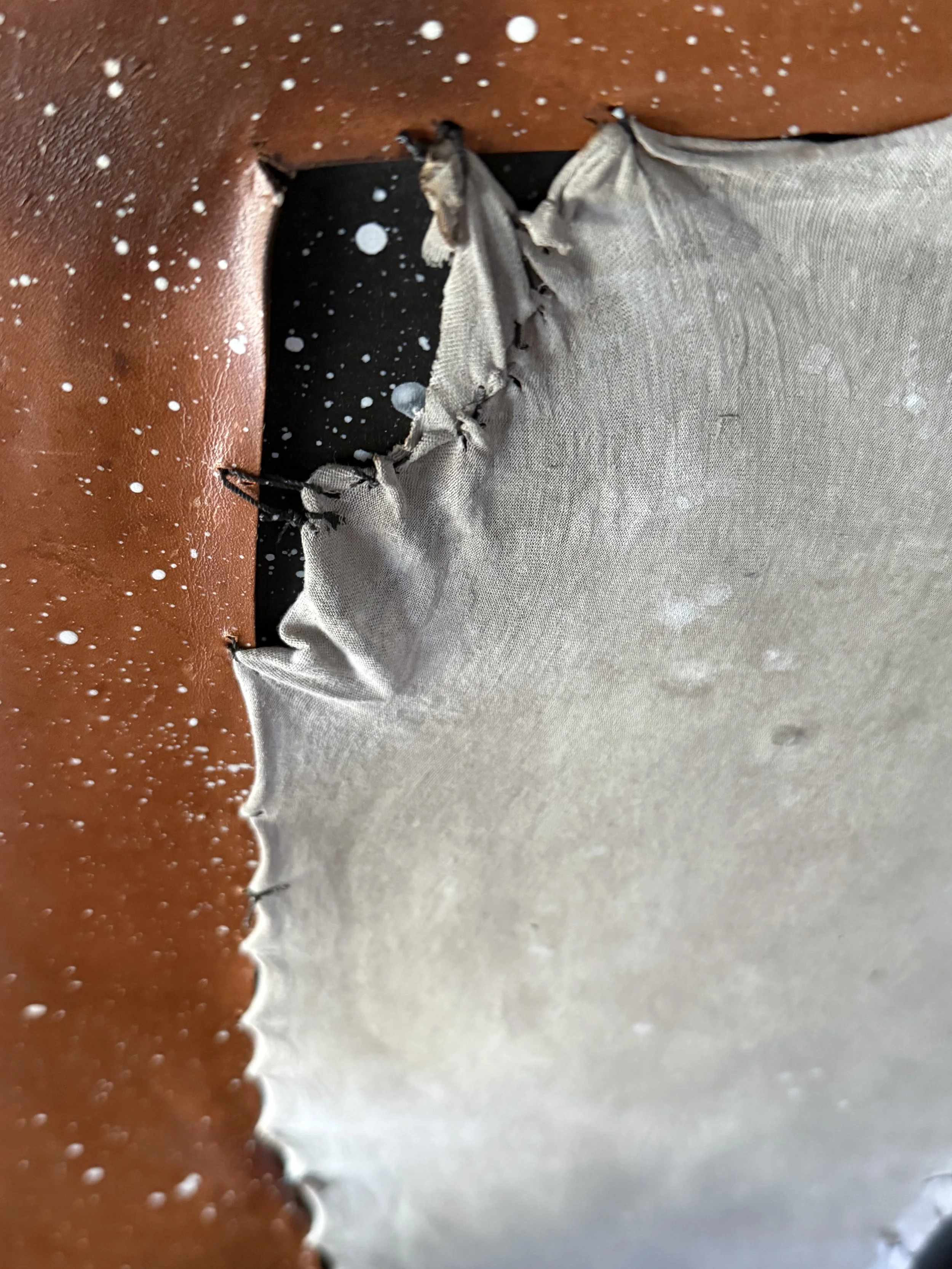 Surface detail from Thin Skin by Michelle Gow, revealing tension, fragility and wear.
