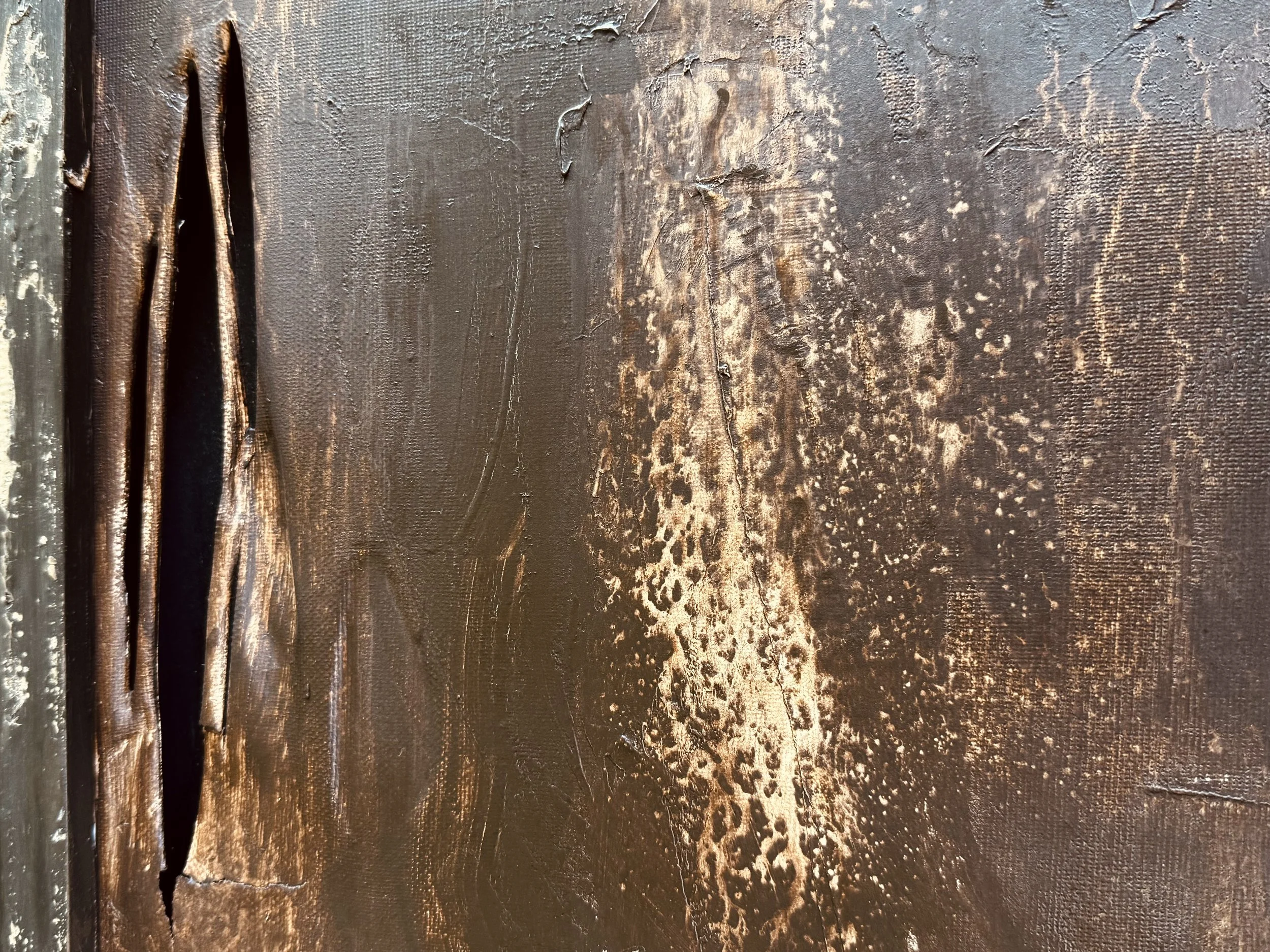Surface detail from Vestiges by Michelle Gow, revealing erosion, fracture and persistence.