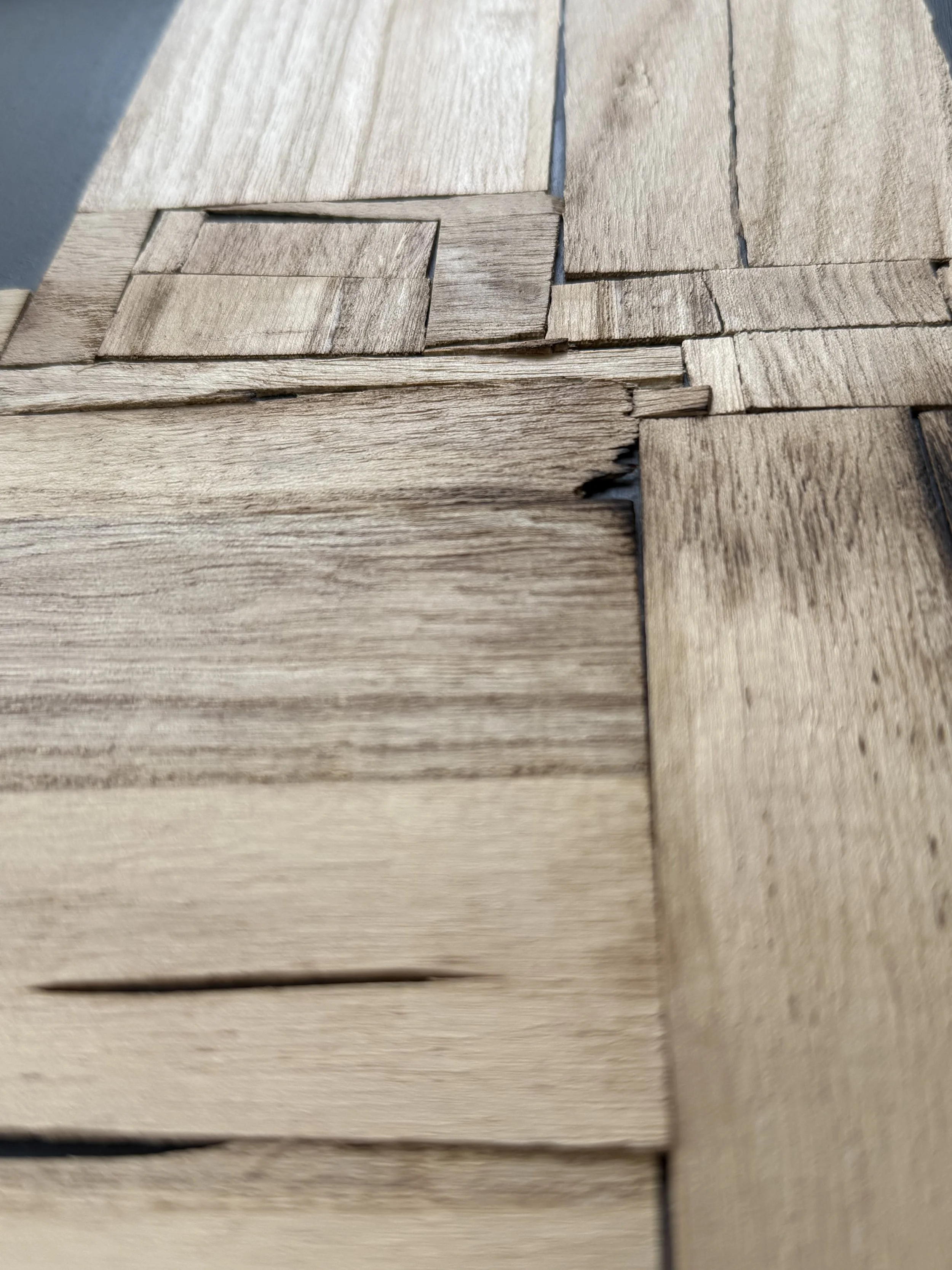 Detail of stacked compressed timber from Load Bearing by Michelle Gow.