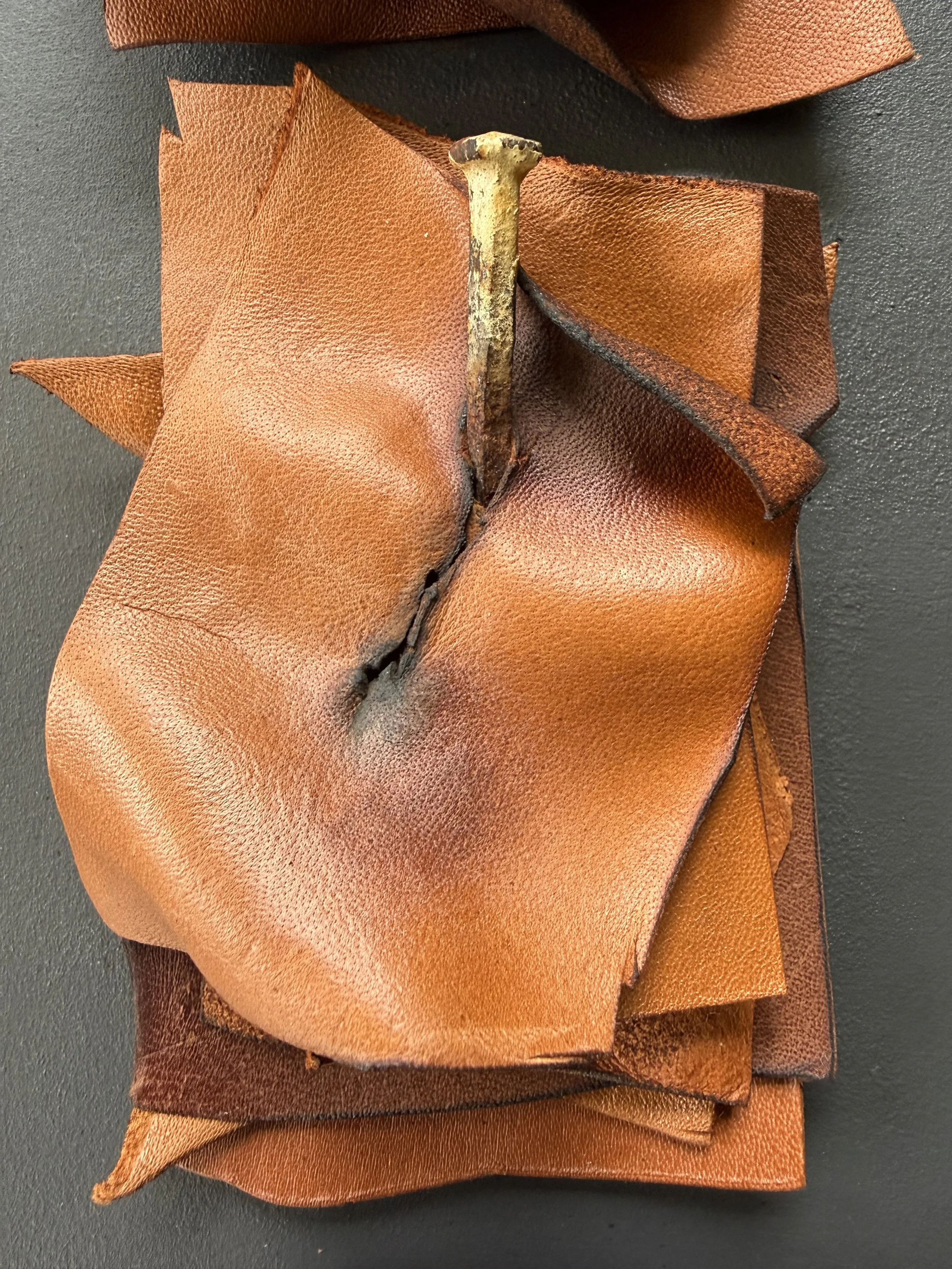Detail of layered leather elements from Scar Tissue by Michelle Gow.