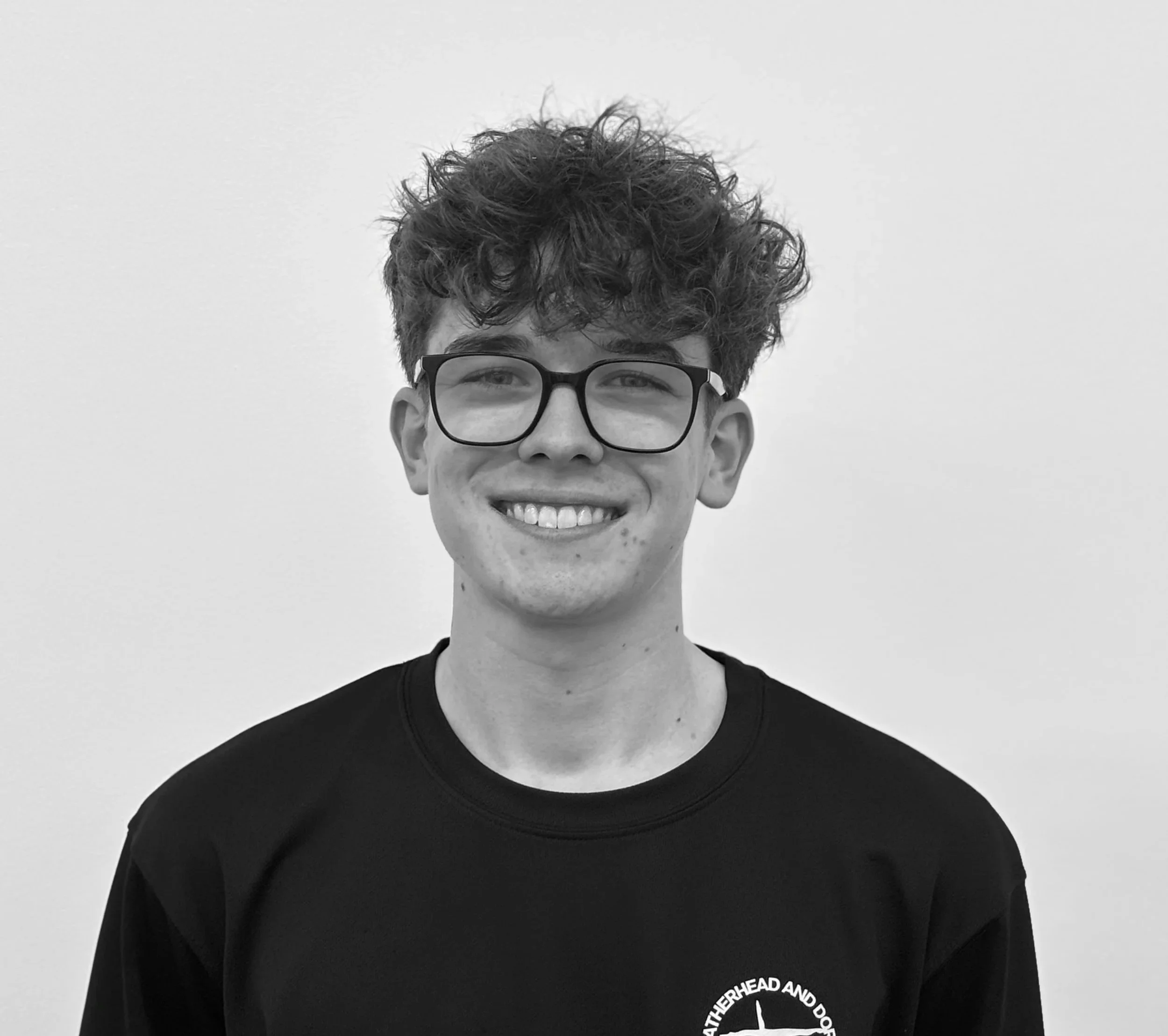 Placeholder image with text reading 'Photo Coming Soon...' and a logo featuring a gymnast doing a split leap with the words 'LEATHERHEAD AND DORING GYMNASTICS CLUB' around it.