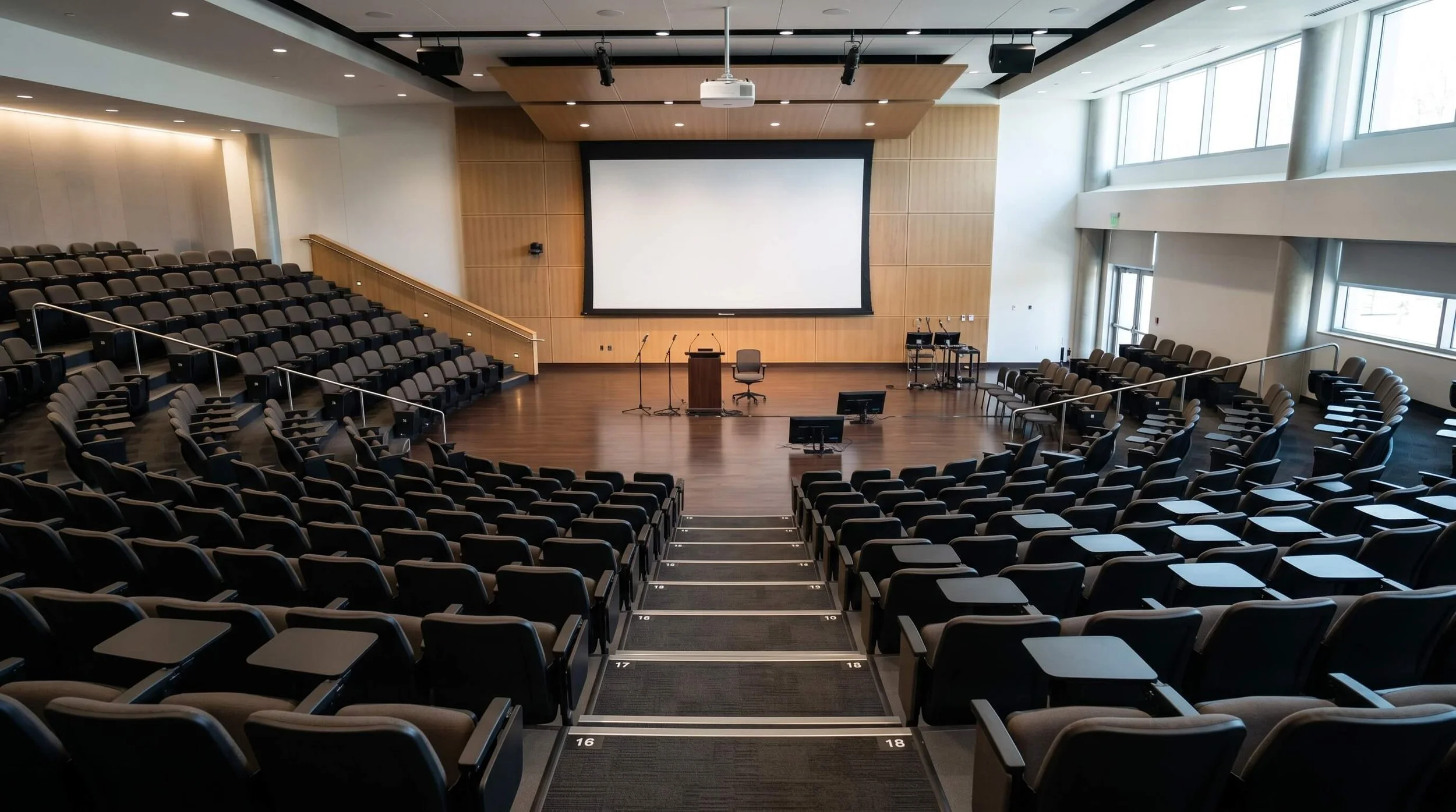 School lecture theatre with tiered seating secured by after-hours security system