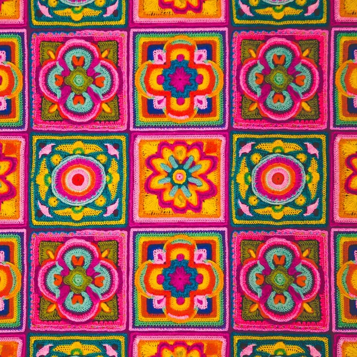 Colorful crochet granny square blankets with floral and geometric patterns arranged in a grid.