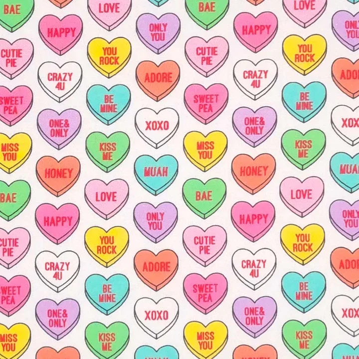 Pattern of colorful Valentine-themed heart shapes with various romantic and affectionate phrases in bright colors like pink, red, yellow, blue, purple, and green.