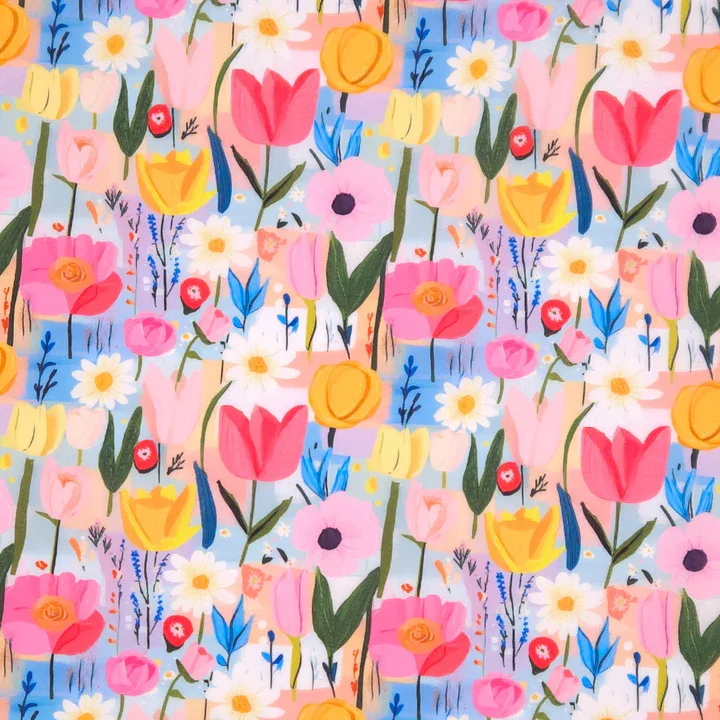 Colorful floral pattern with pink, yellow, and blue flowers, green leaves, and small red and white ladybugs.
