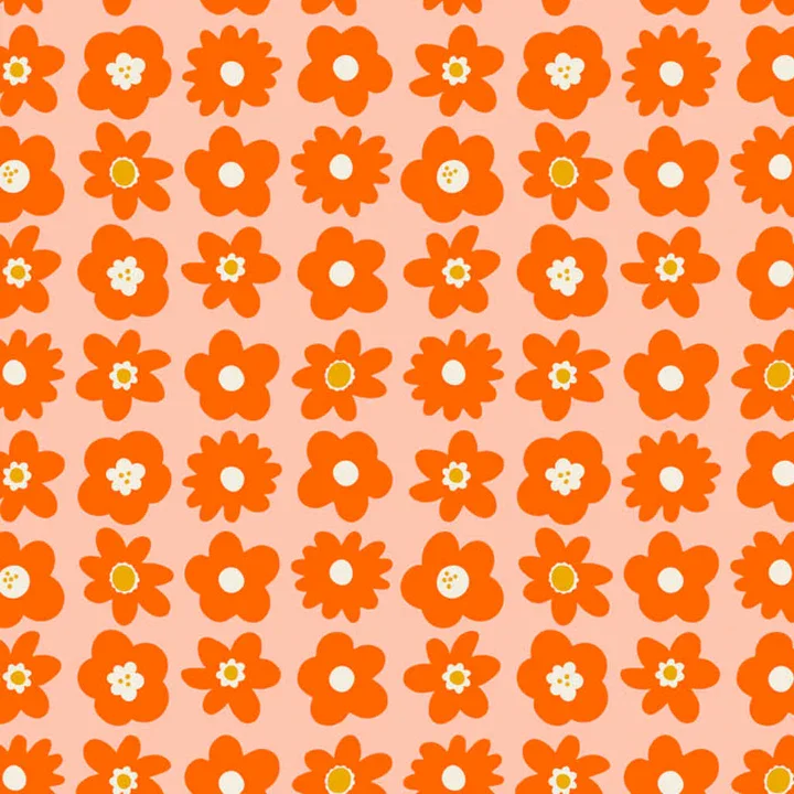 Pattern of orange and white floral shapes on a pink background.