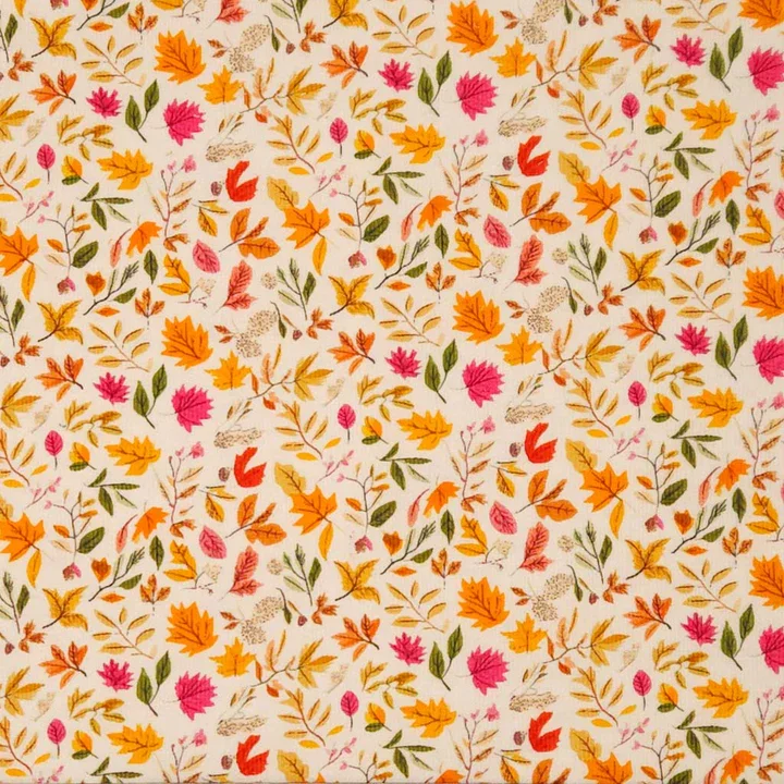 Pattern of various colorful autumn leaves and small flowers on a light background.