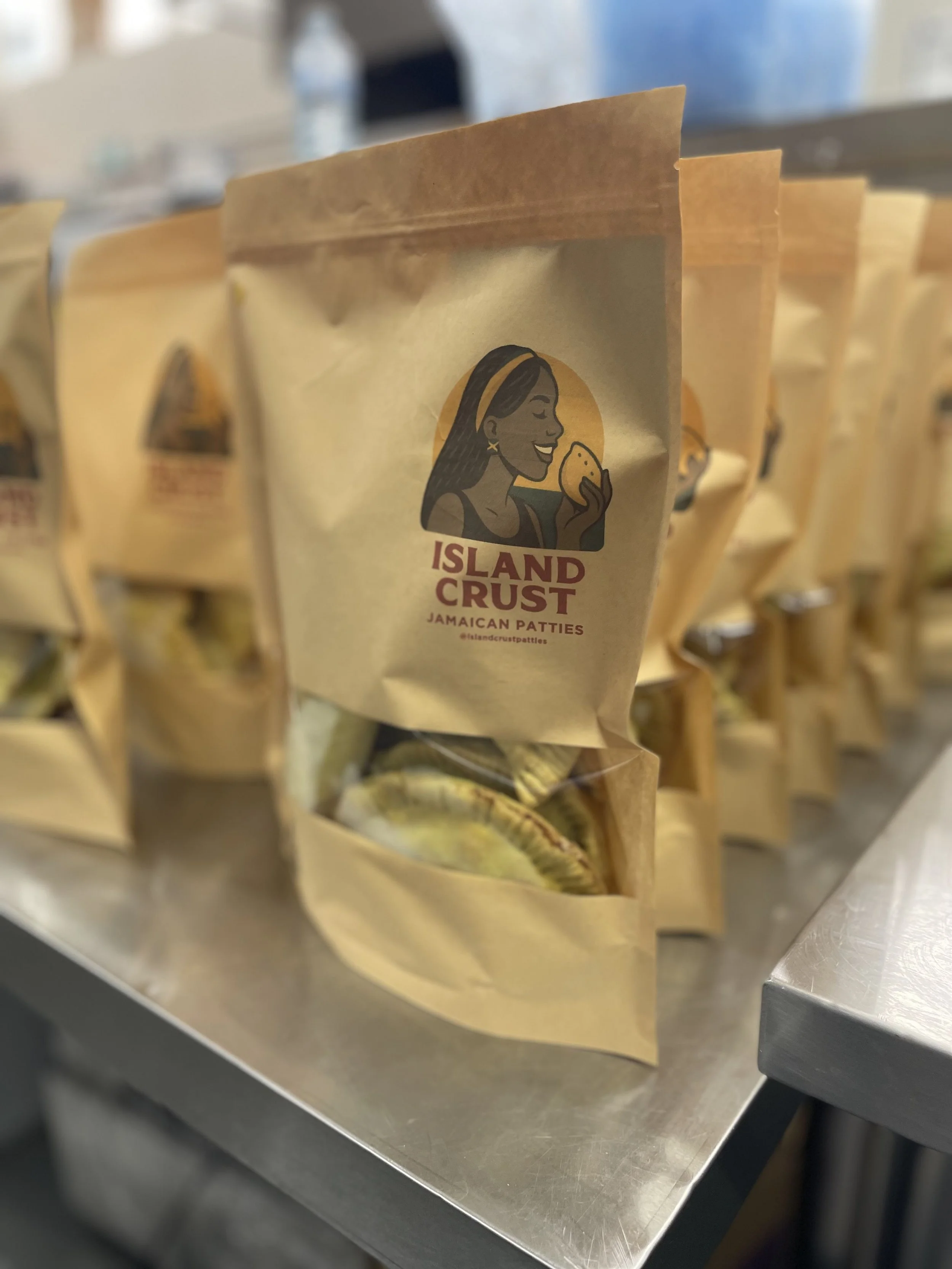 Package of Island Crust Jamaican Patties on store shelf.