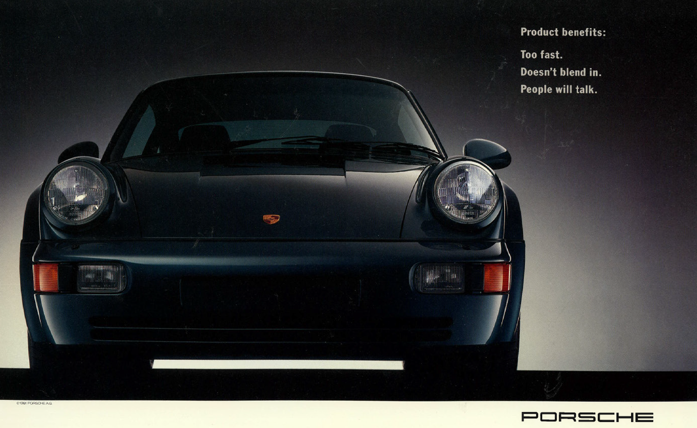 Front view of a black Porsche 911 sports car with the Porsche logo on the hood, against a dark background, with text on the upper right listing product benefits and Porsche branding at the bottom.