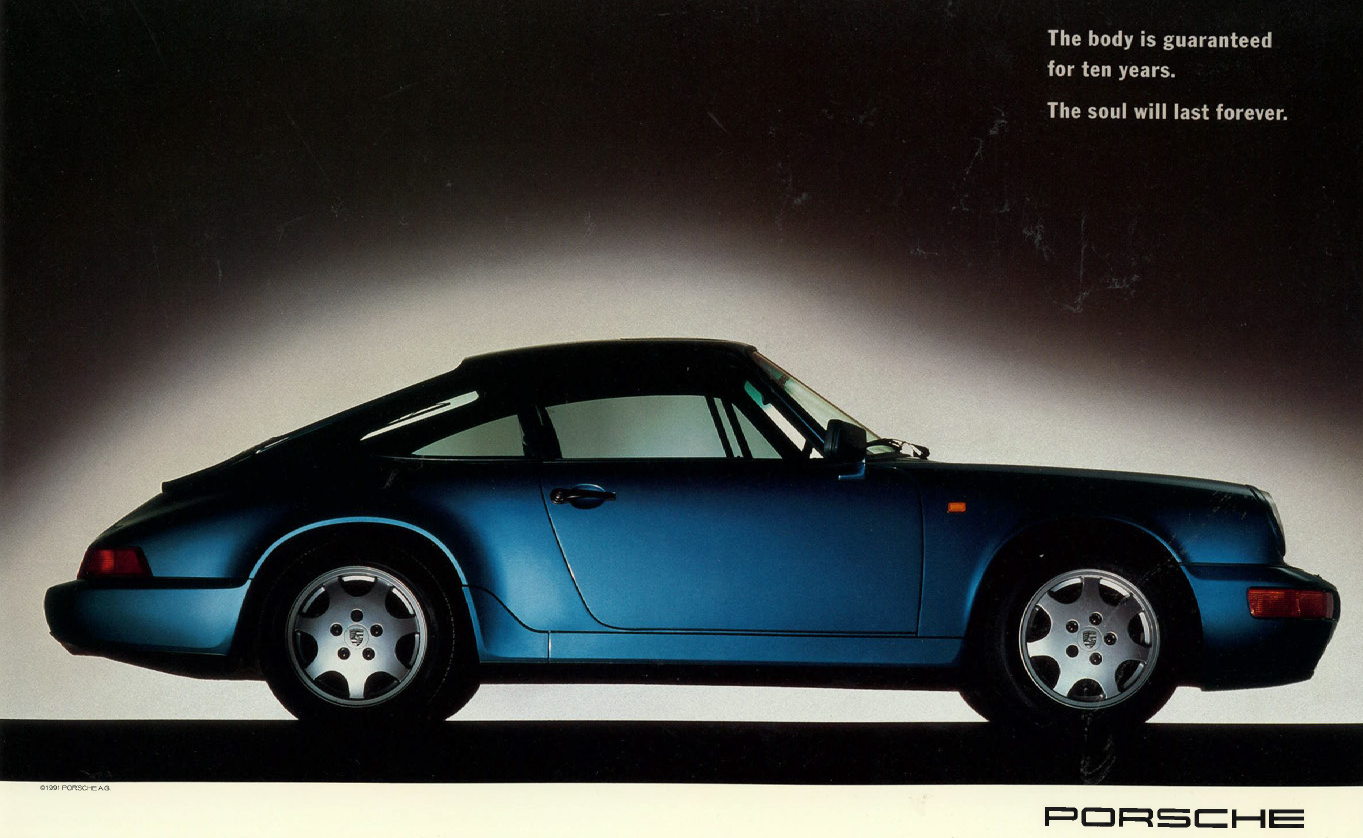 Side view of a classic blue Porsche sports car against a dark background with white gradient lighting. Text in the upper right corner reads, "The body is guaranteed for ten years. The soul will last forever." The Porsche logo is at the bottom right.