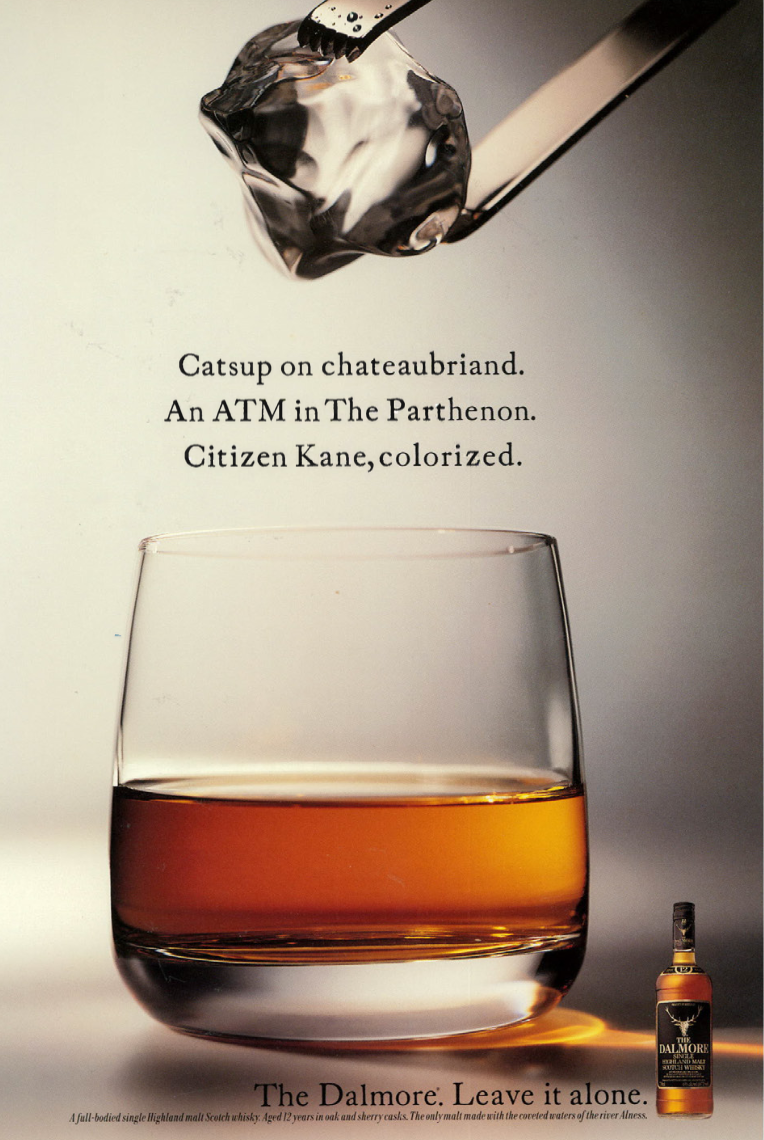 Advertisement featuring a glass of whiskey with ice and a bottle of The Dalmore whiskey. The text mentions a catsup on chateaubriand, an ATM in the Parthenon, and Citizen Kane being colorized.