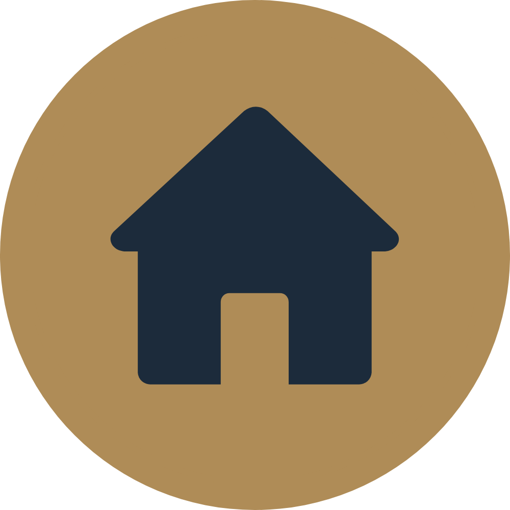 Icon of a house with a dark blue silhouette on a gold circular background.