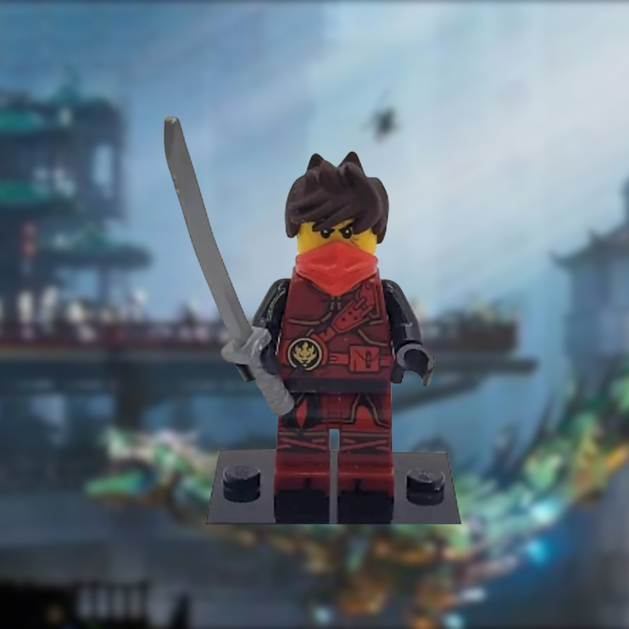 Lego minifigure dressed as a ninja with a sword, wearing a red and black outfit, set against a blurred background.