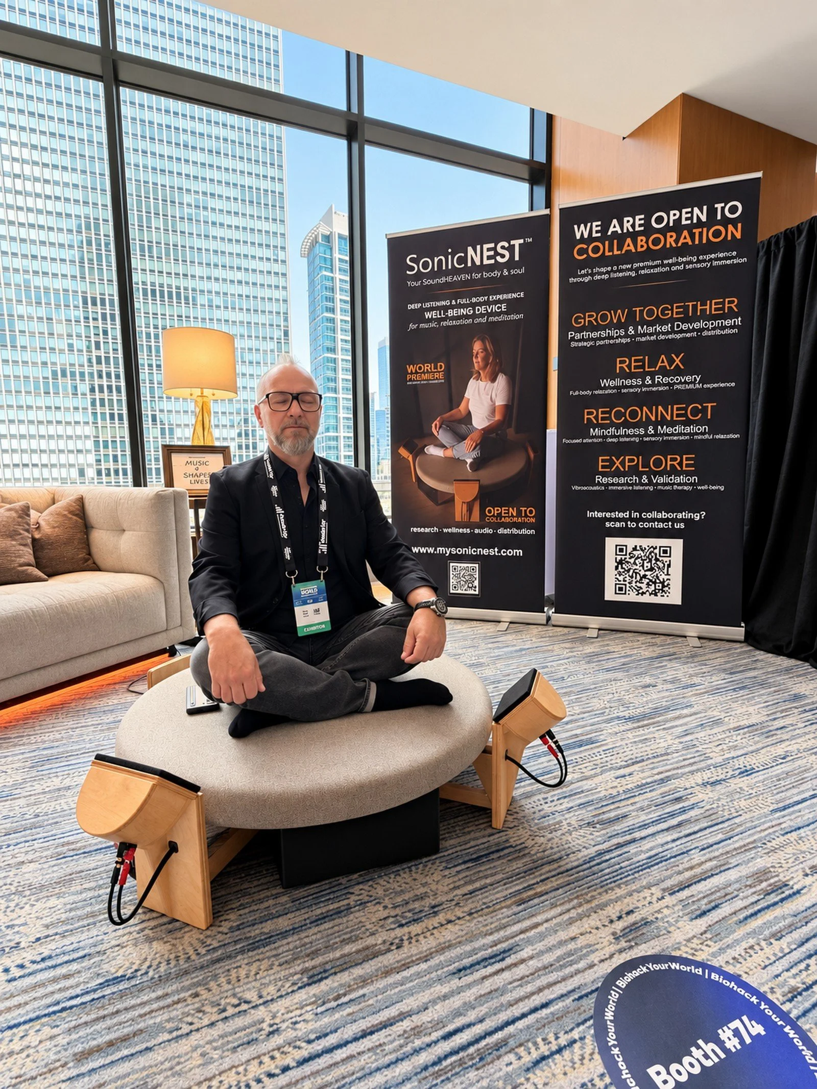 Founder and designer Tom Fechter experiencing SonicNEST™ at Biohackers World Chicago 2026 during a short immersive audio and vibroacoustic session for deep relaxation and sensory presence.