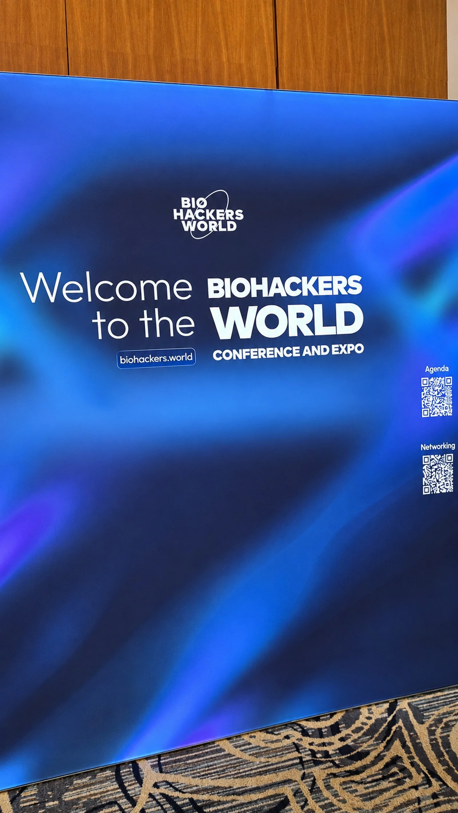 Biohackers World Conference and Expo Chicago 2026 sign, marking the world premiere event for SonicNEST™ immersive audio and vibroacoustic experience.