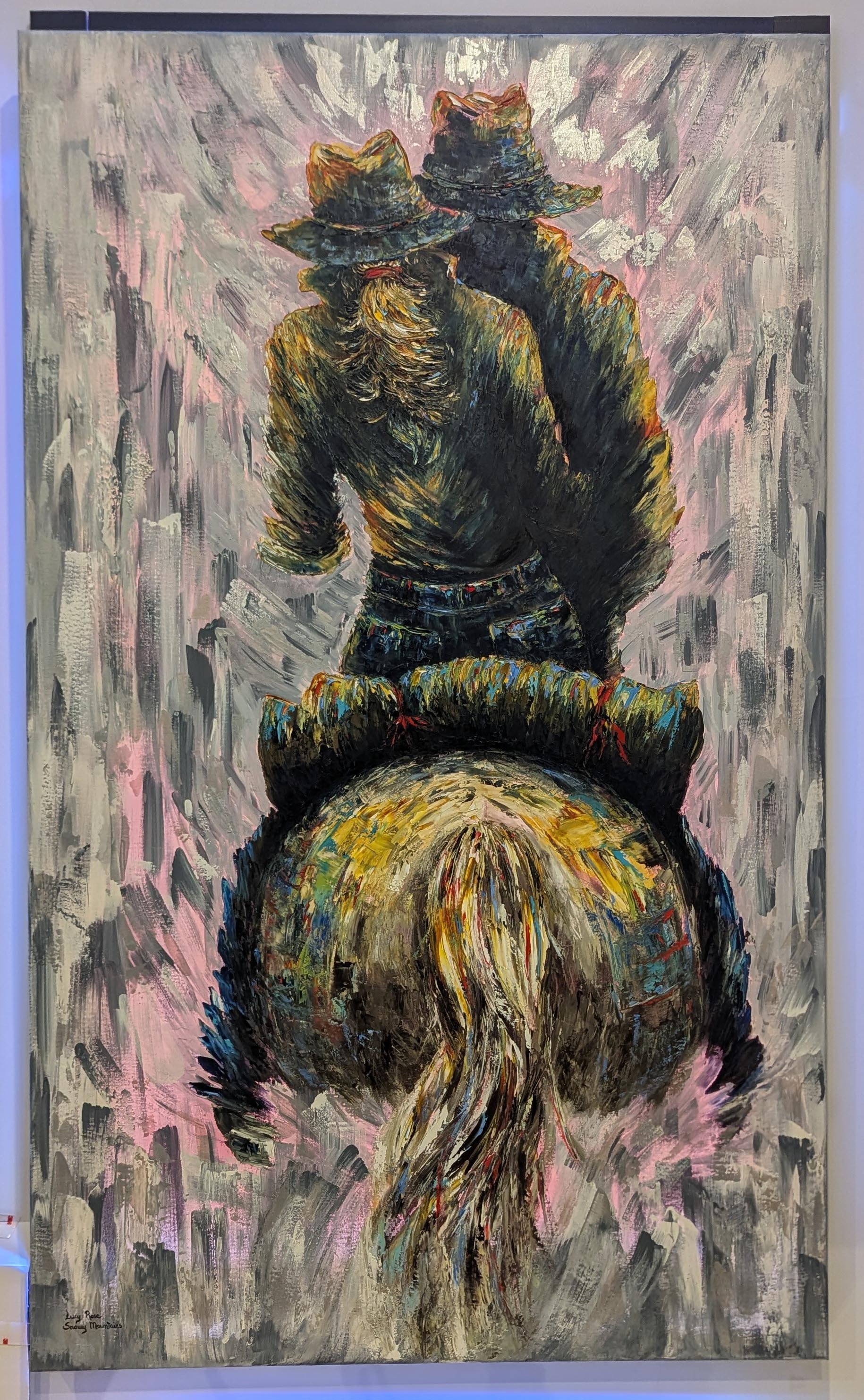 An abstract painting of a person with long hair seen from the back, kneeling, with two figures in cowboy hats standing in front. The background is textured with pink, gray, and black strokes.