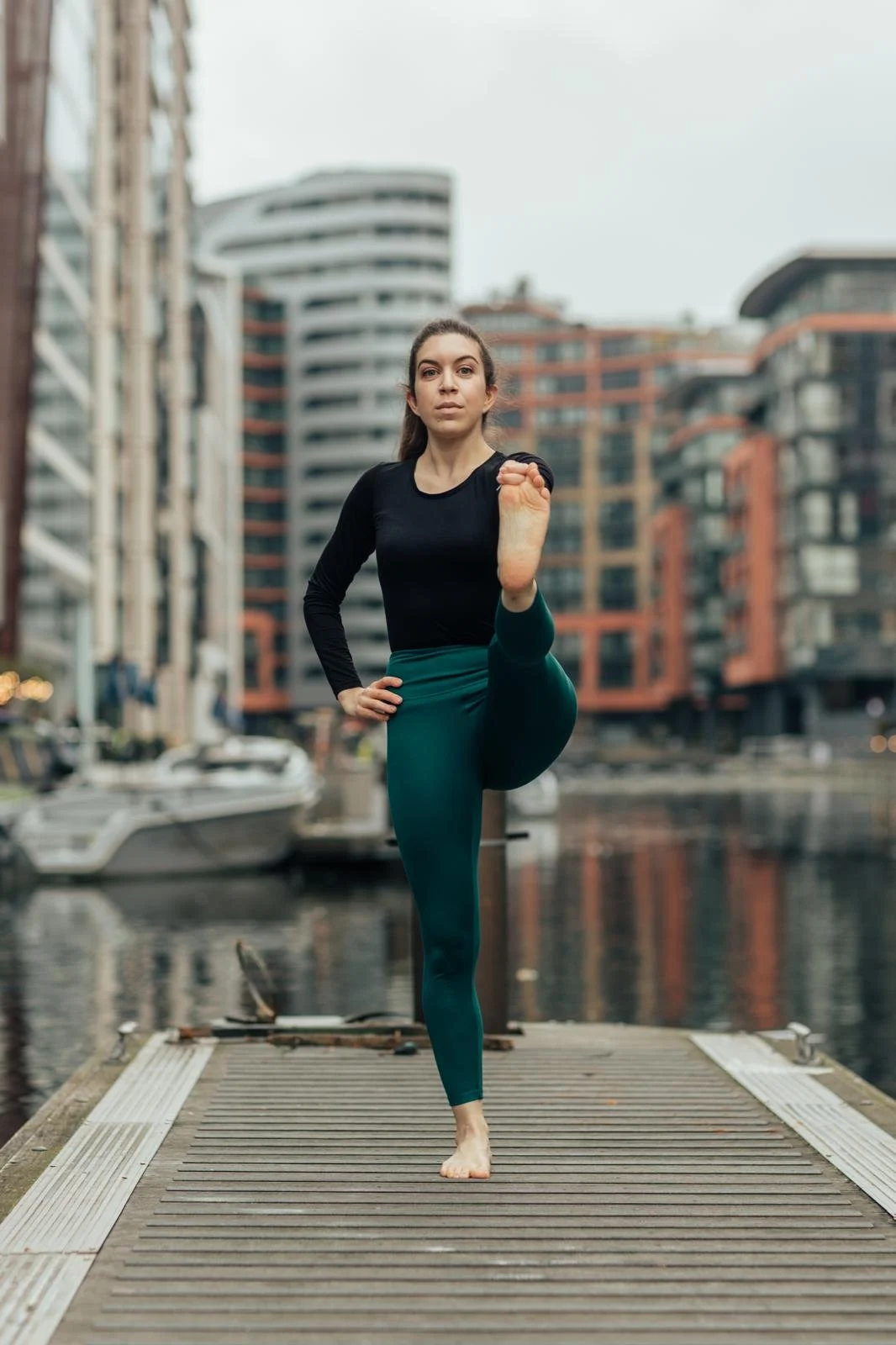 A photo of Christie practicing yoga asana in London.