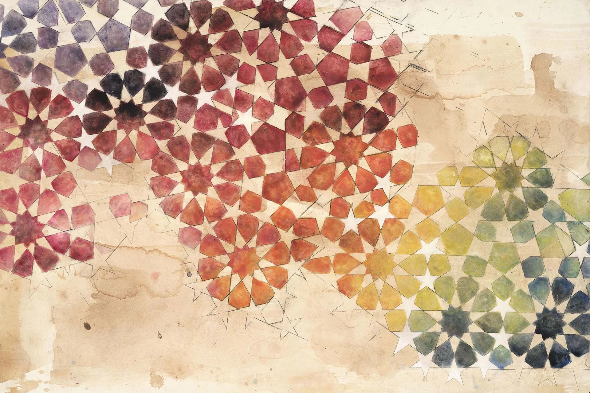 A watercolor painting of geometric star-shaped and polygonal patterns in red, orange, yellow, green, and black on a textured beige background.