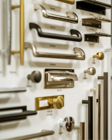 Display of various cabinet and drawer handles in different metals and finishes.
