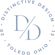 Logo with the text 'Distinctive Design 20 Toledo Ohio 13' around a stylized D/D symbol in the center.
