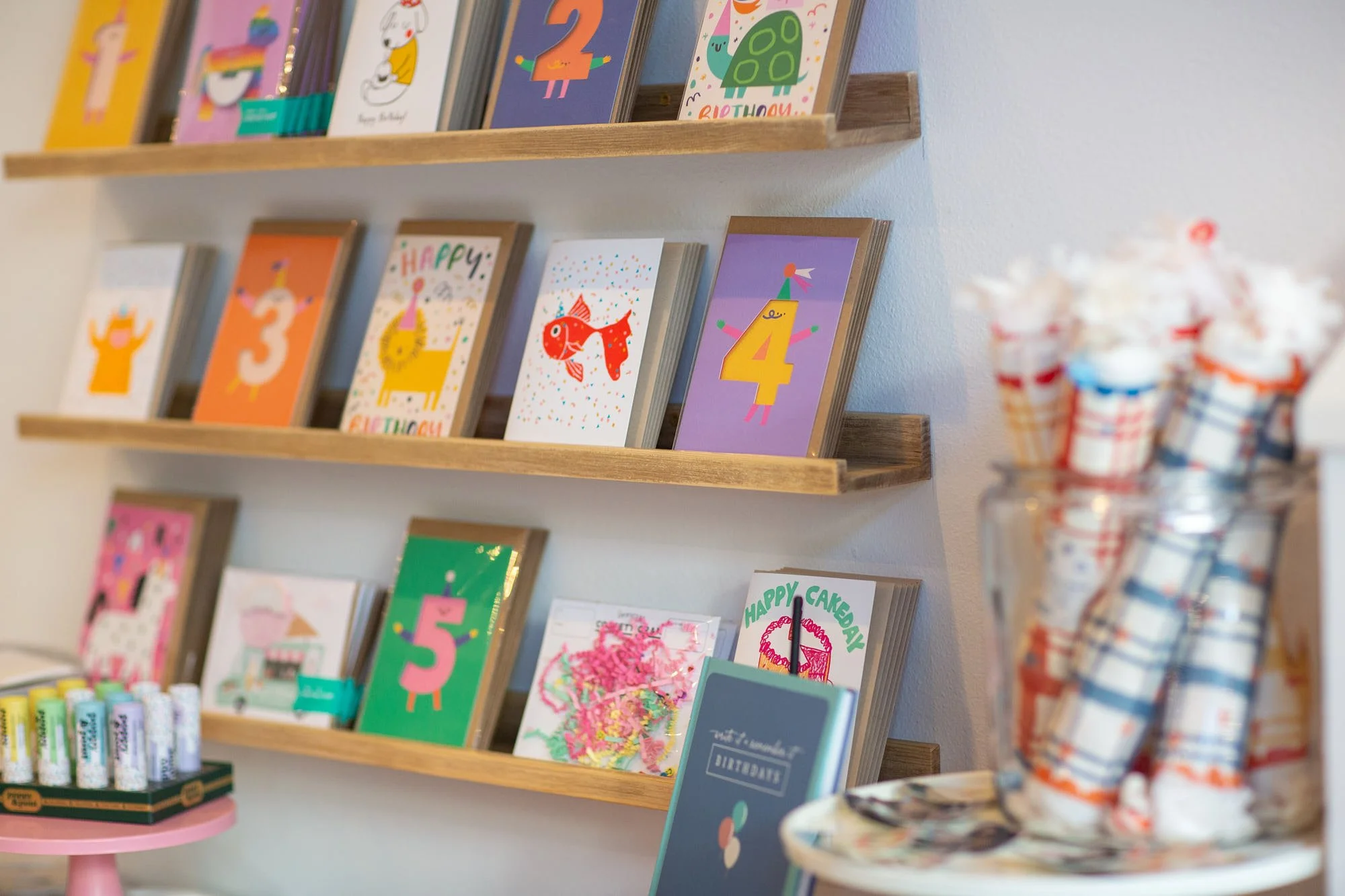 poppie-madrona-seattle-shopping-birthday-cards-milestone-numbers-shelf.jpg