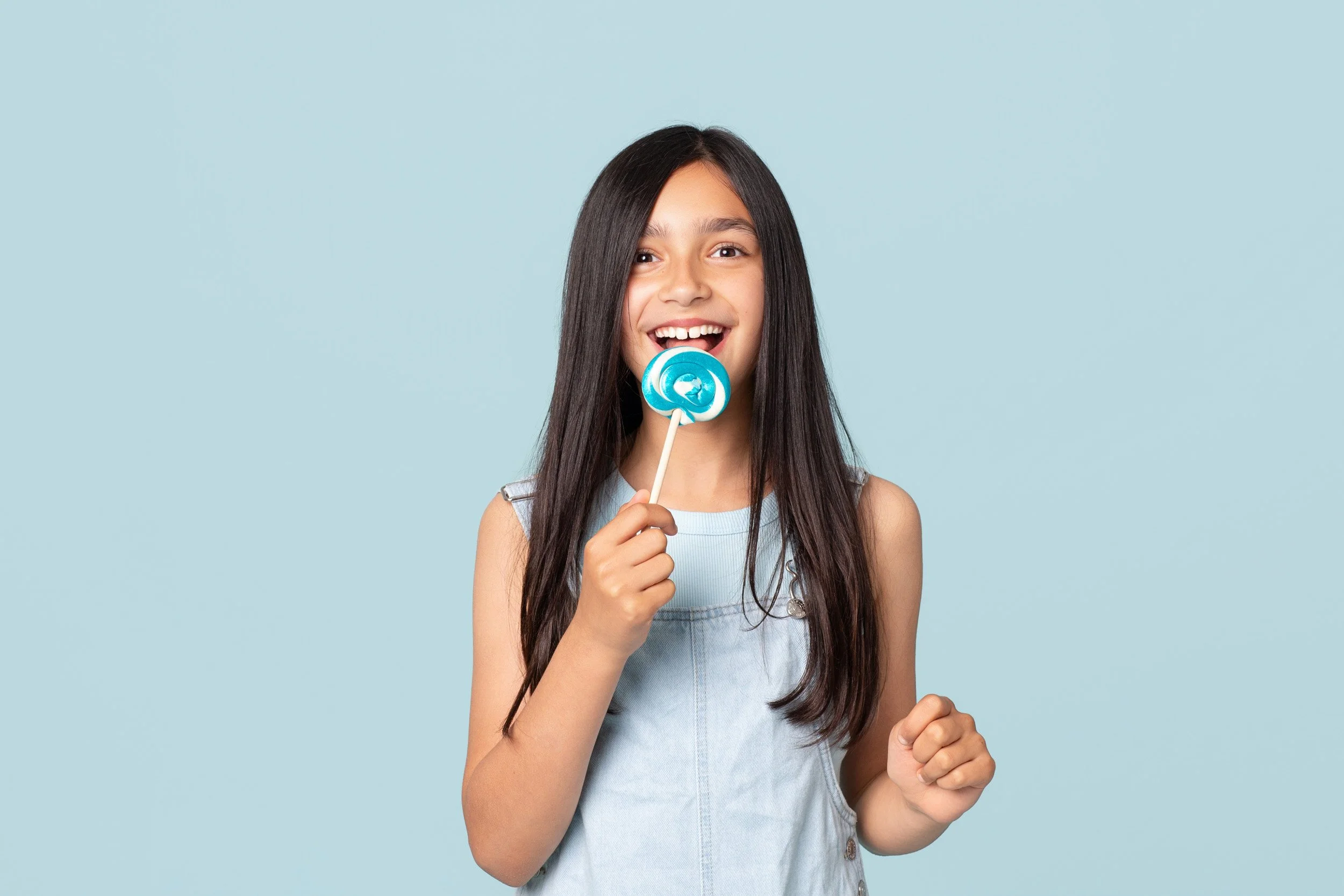 girl-lollipop-birthday-portrait-blue.jpg
