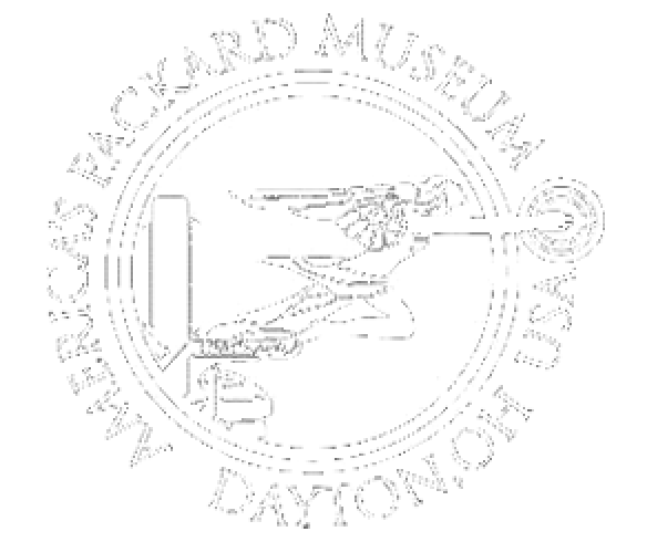 Seal for the America's Packard Museum in Dayton, USA, featuring a bird with a key in its beak, surrounding text with museum name and location.