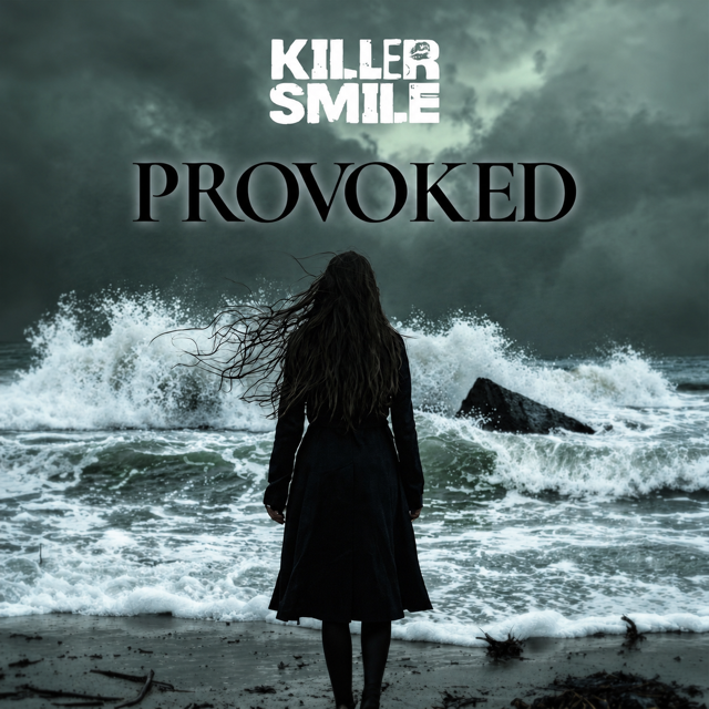 A woman with long hair standing on a beach facing the stormy ocean with waves crashing and dark clouds overhead. The image features the text "Killer Smile" and "Provoked".