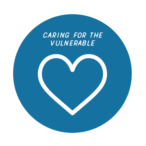 Blue circular logo with a white heart outline and the text "Caring for the Vulnerable" above the heart.