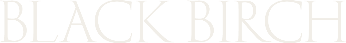 Text reading 'BLACK BIRCH' in white on a black background.