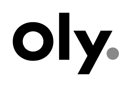 A gray ball hitting a nipple-shaped target on a pole with a black background.