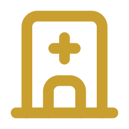 Gold icon of a hospital or medical building with a cross symbol on the front.
