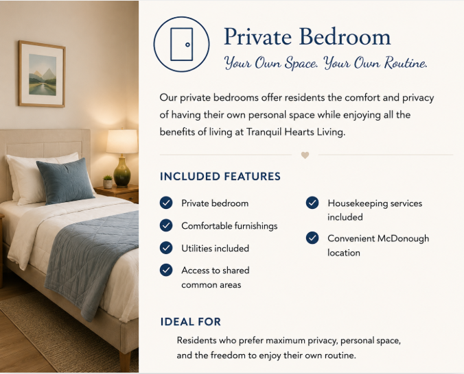 Interior bedroom with beige walls, framed landscape art, bed with white sheets, blue throw blanket, and pillows, along with a nightstand, lamp, and decorative items.