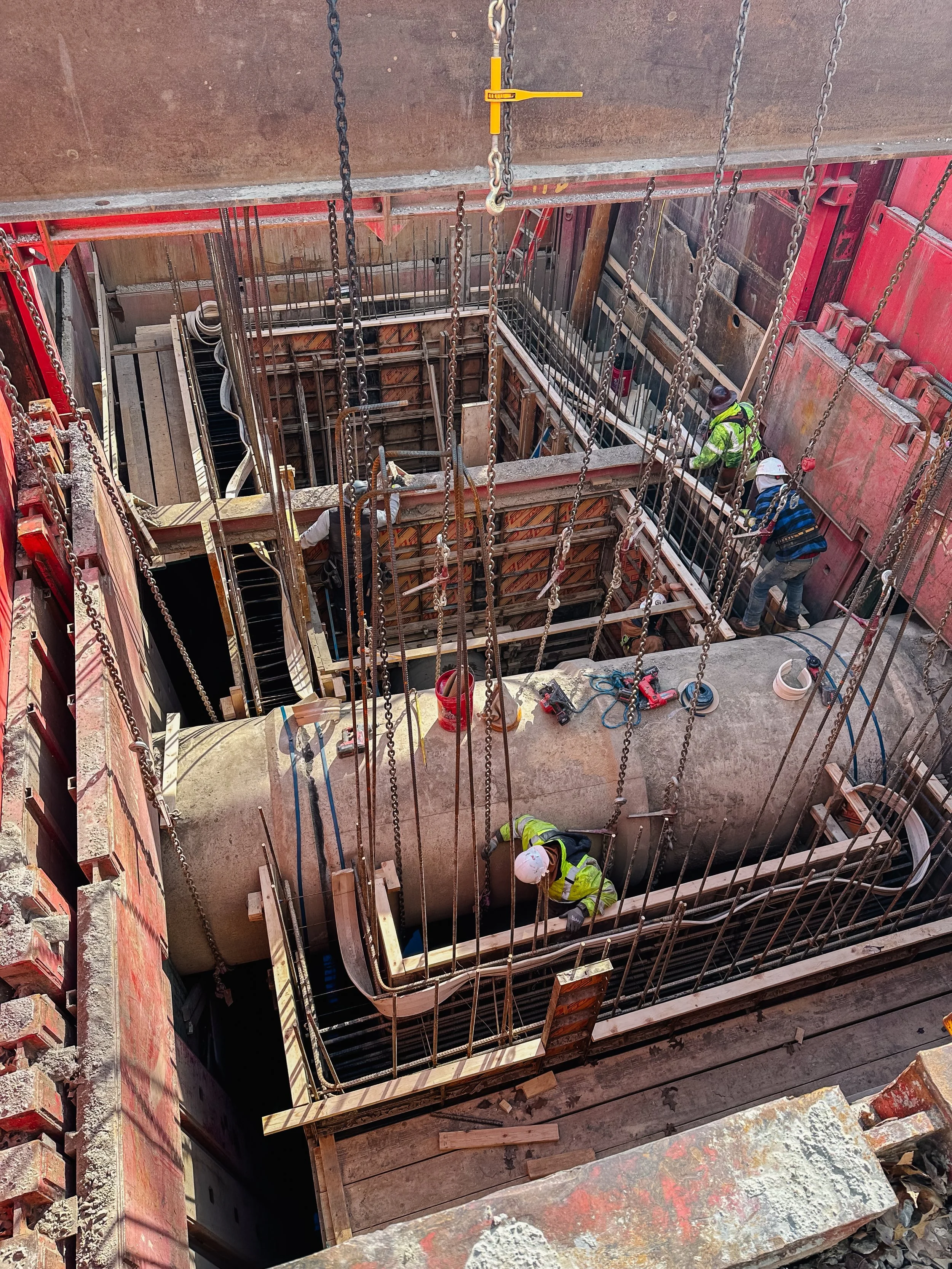 Dunigan Bros. crew members performing shoring and excavation support work in an open cut trench