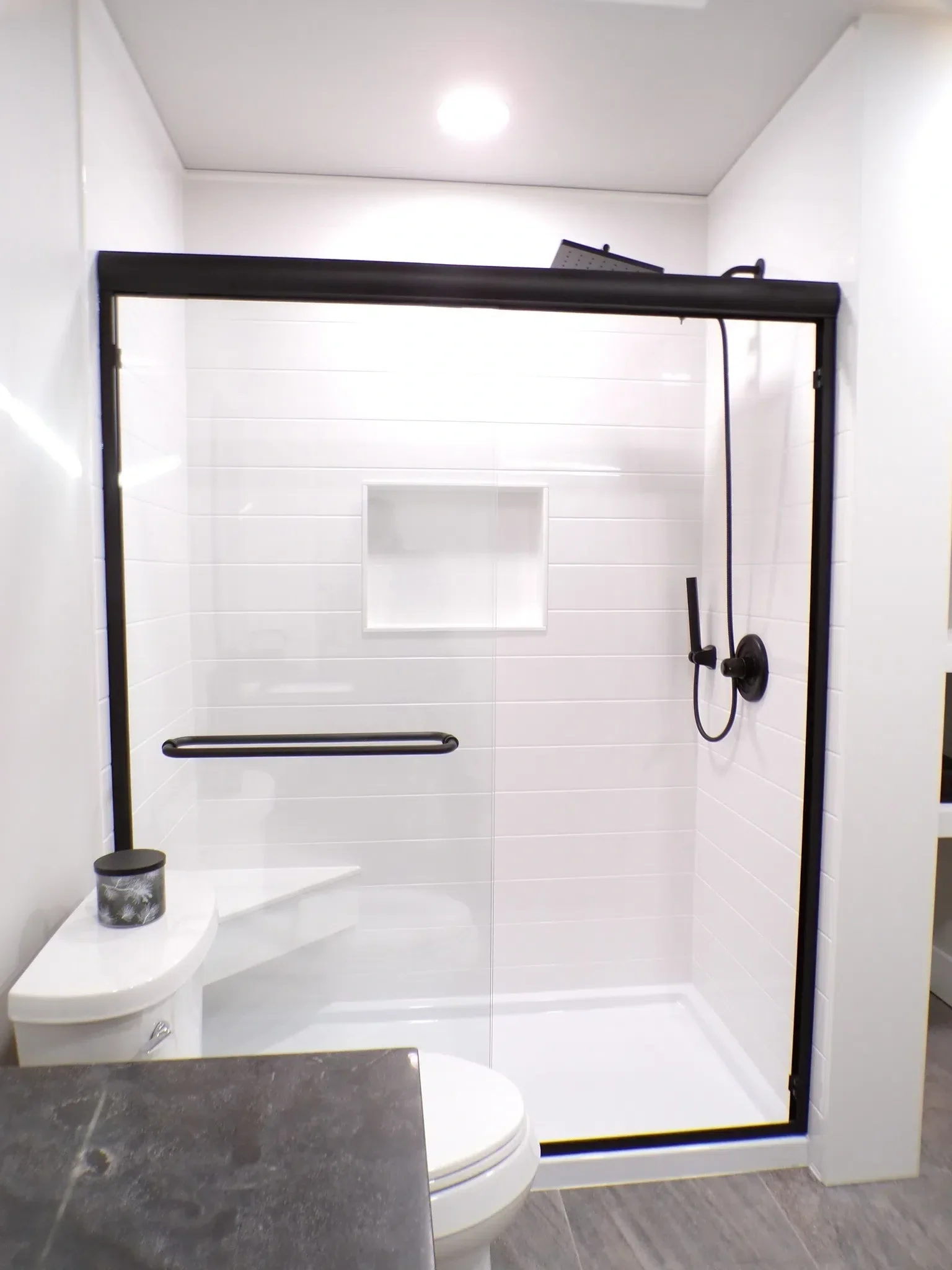 ONYX Collection custom shower and bath surfaces — installed by All Pro in Hutchinson, KS