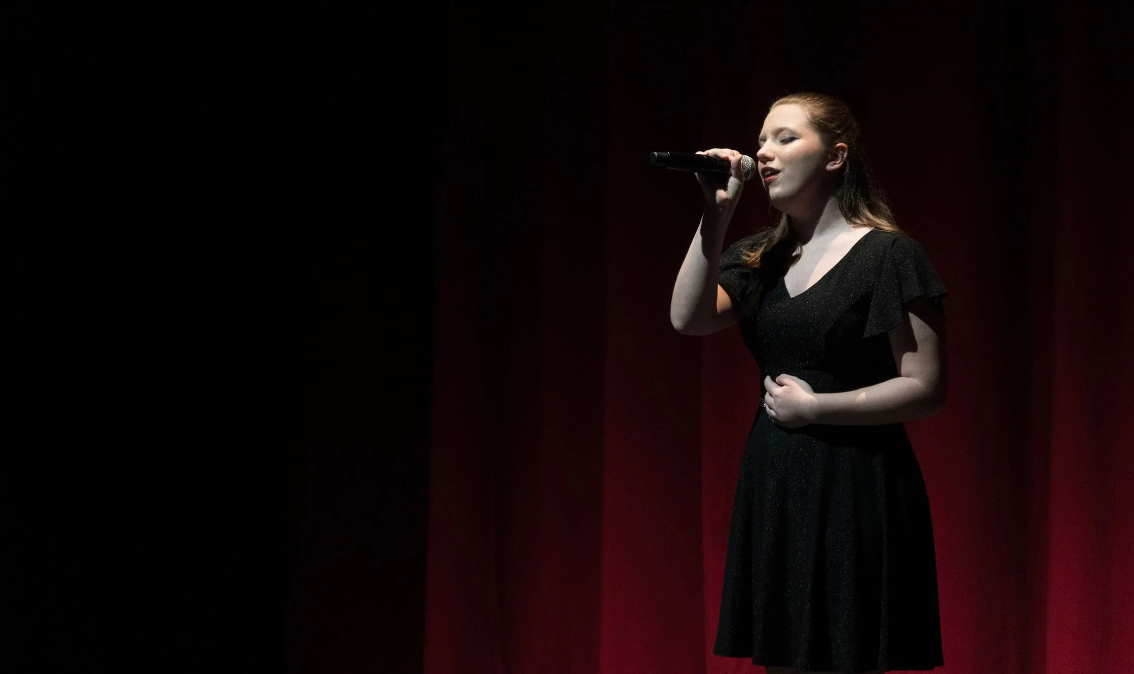 student singing