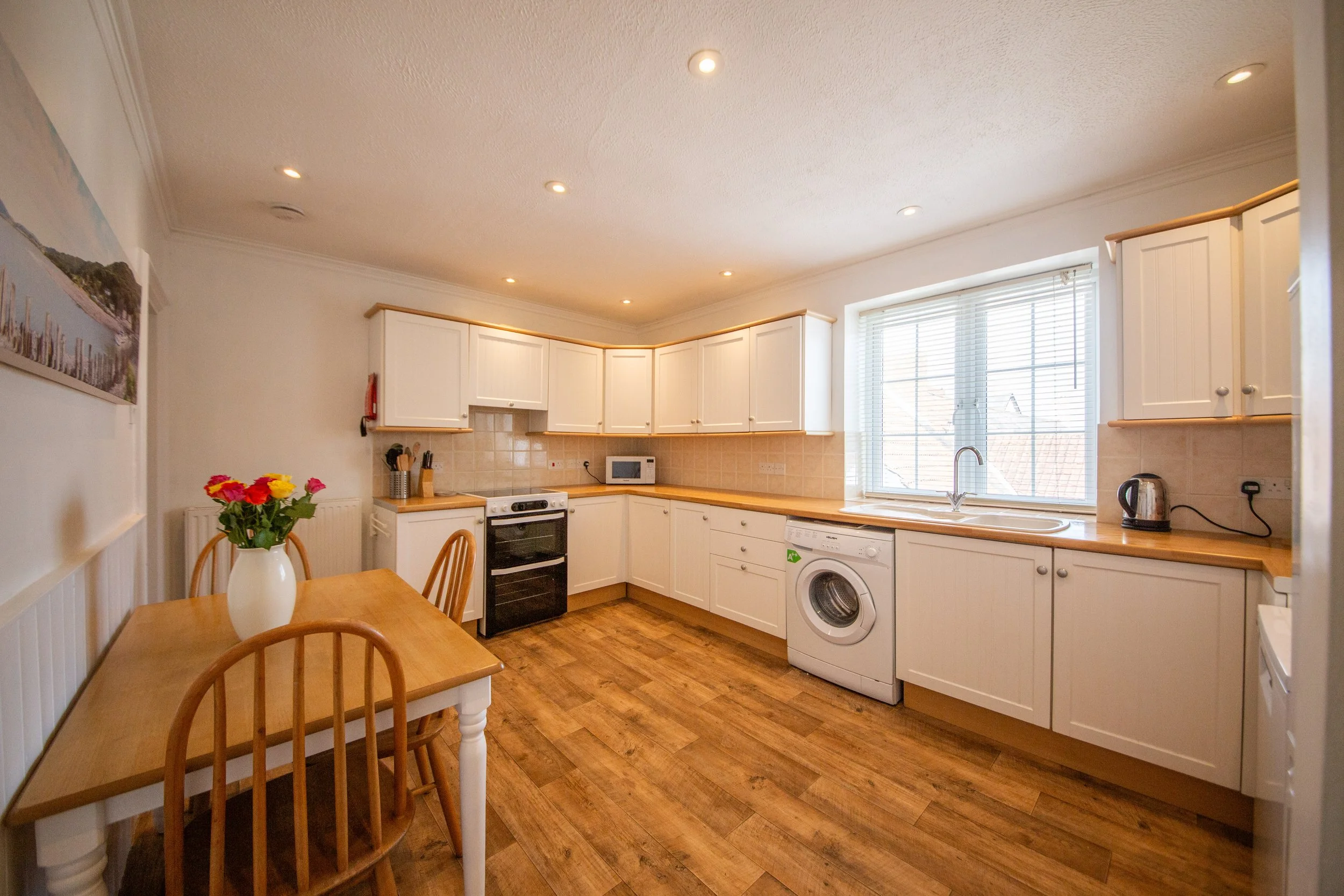 7 kitchen from stairs door.jpg