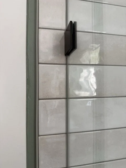 Close-up of precision tile installation featuring straight grout lines and quality craftsmanship.